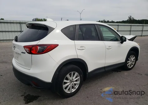 2014 Mazda Cx-5 Touring z USA, uszkodzony, nr VIN JM3KE4CY8E0372638
